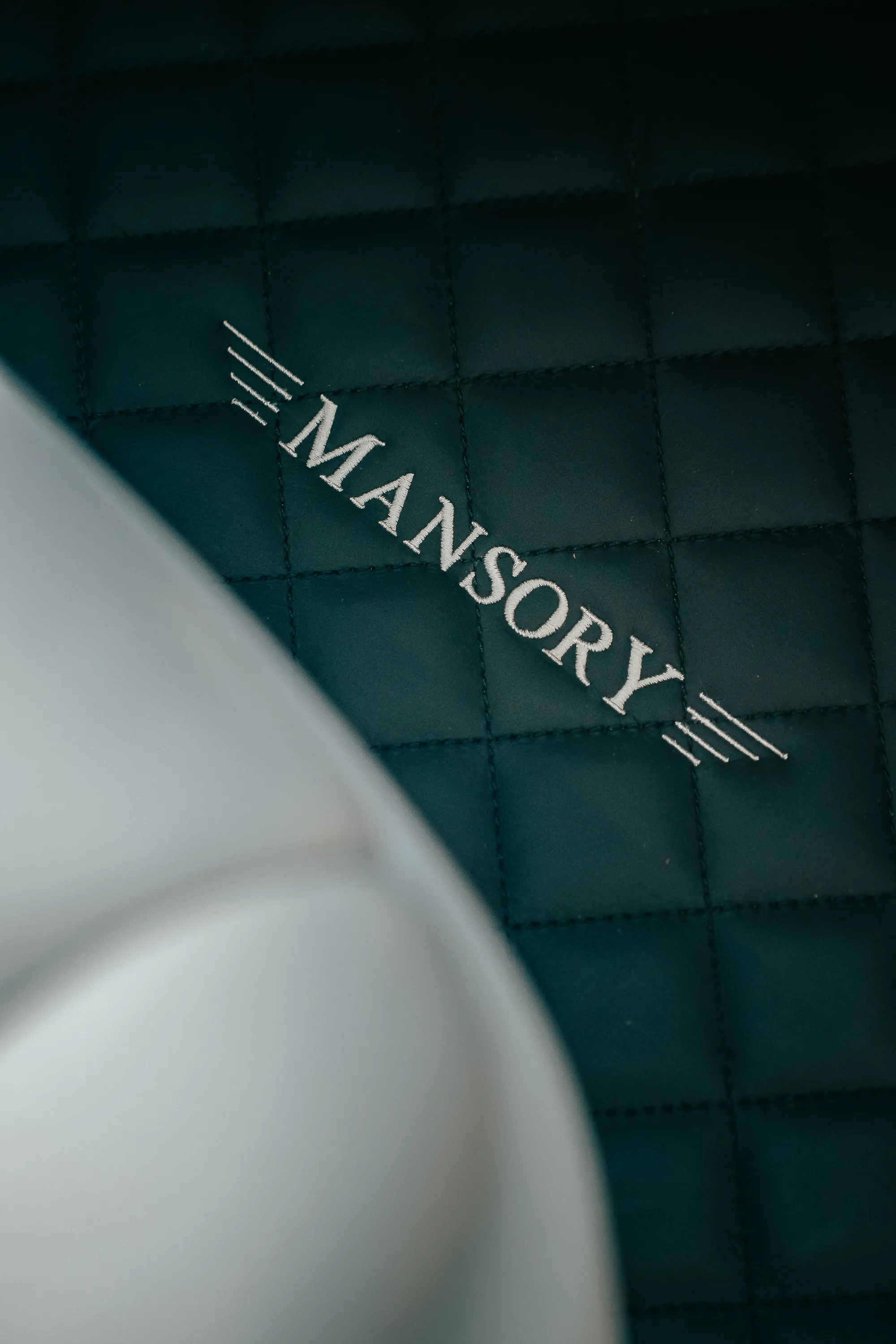 MANSORY stitching on the white leather interior of the Prestige Guard Rolls-Royce Phantom